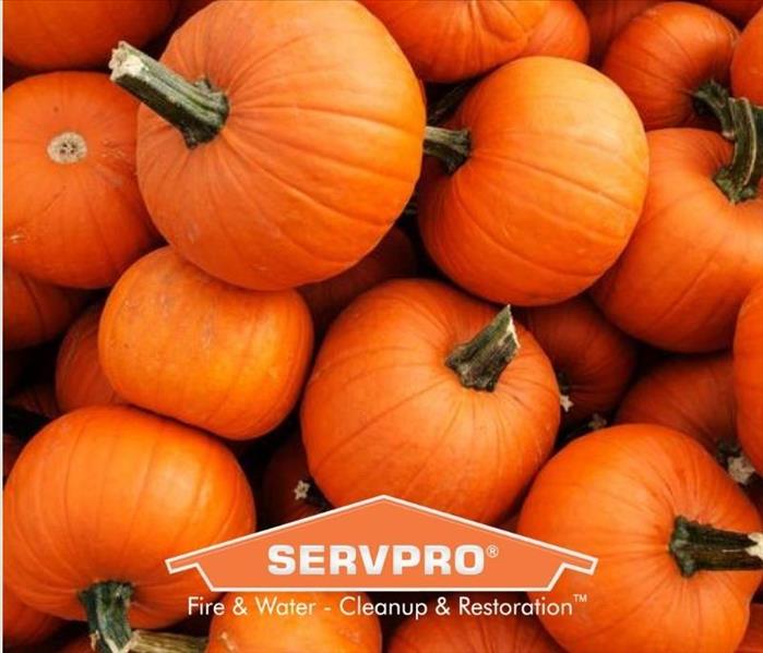 Orange pumpkins with SERVPRO logo